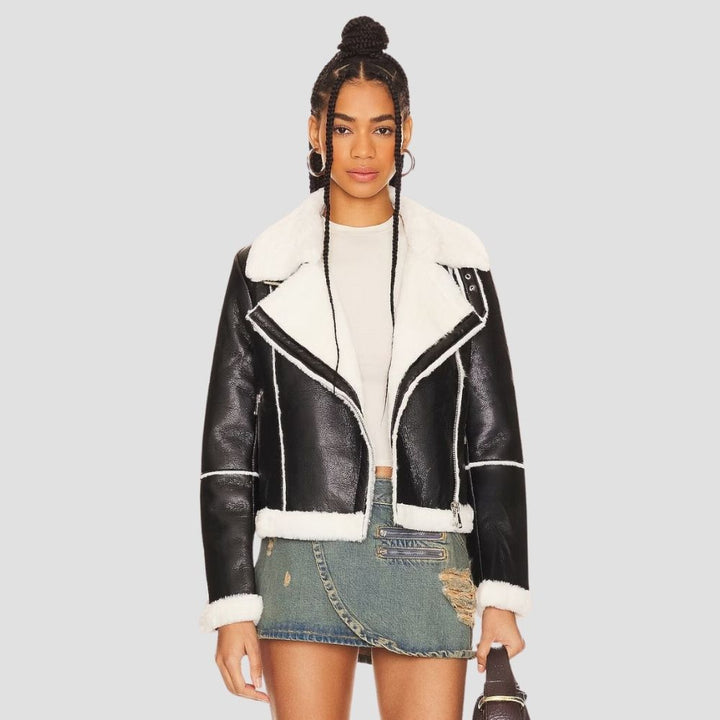 Stay warm and stylish with this women’s fur leather jacket. Ideal for versatile cold weather fashion, it blends luxurious fur with smooth leather for a fashionable look.