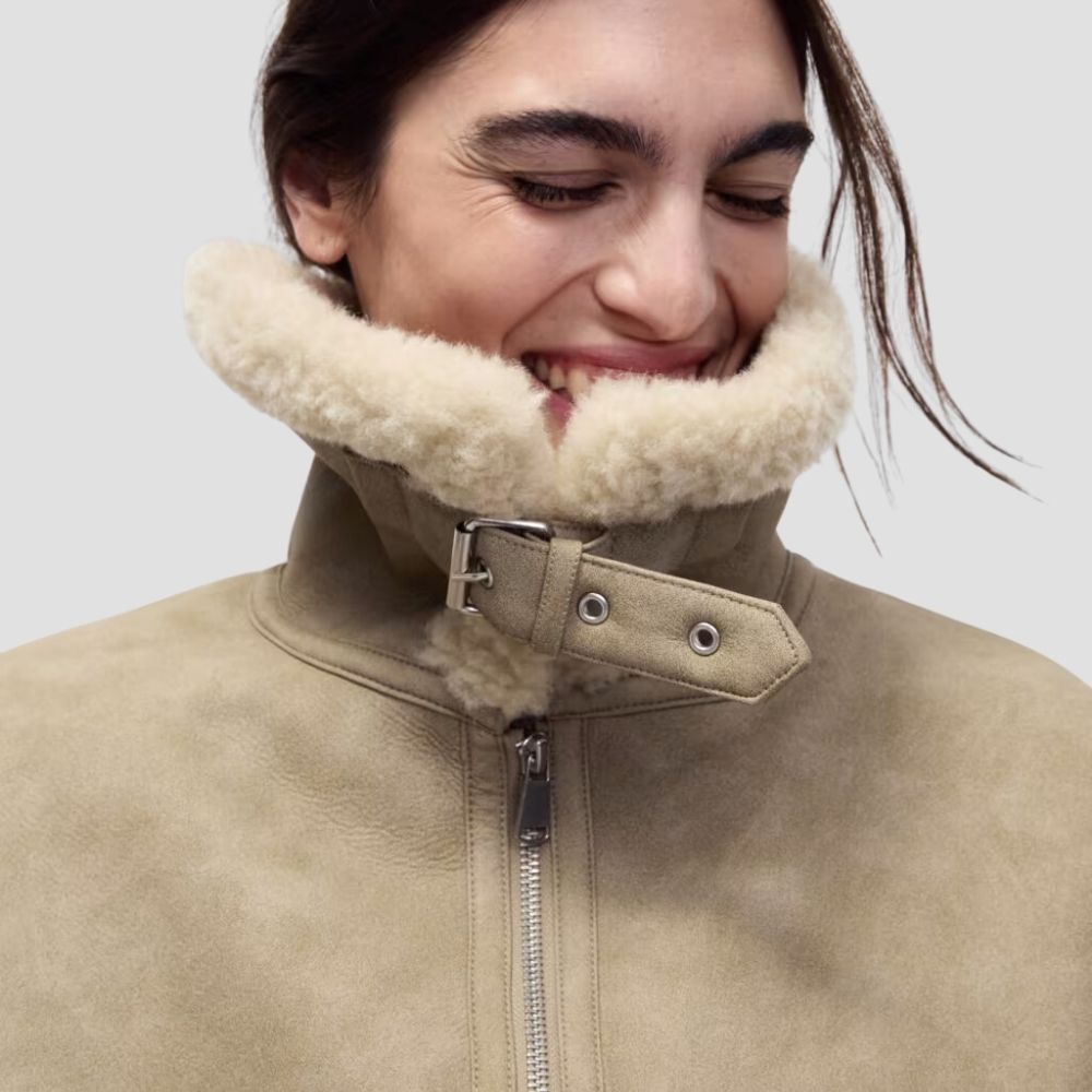 Embrace the outdoors in style with this women’s Sherpa leather jacket. Featuring a soft Sherpa lining and durable leather, it’s perfect for adventure-ready fashion.