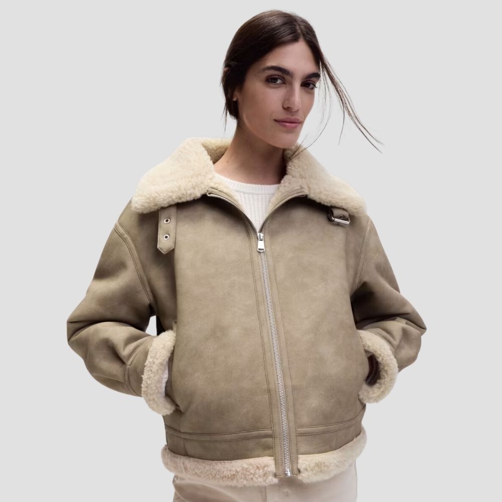 This women’s Sherpa leather jacket is perfect for stylish outdoor adventures. With its cozy Sherpa lining and sleek leather exterior, it offers warmth and fashion-forward style.